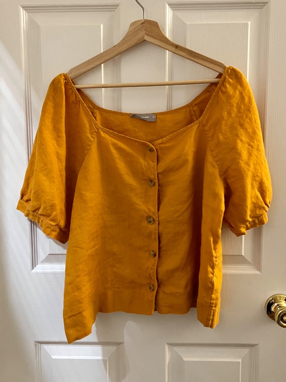 Selena Gomez Everlane Linen Puff Sleeve Top in Marigold Yellow